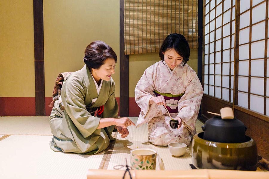 Kyoto tea ceremony experience serving matcha in a traditional townhouse