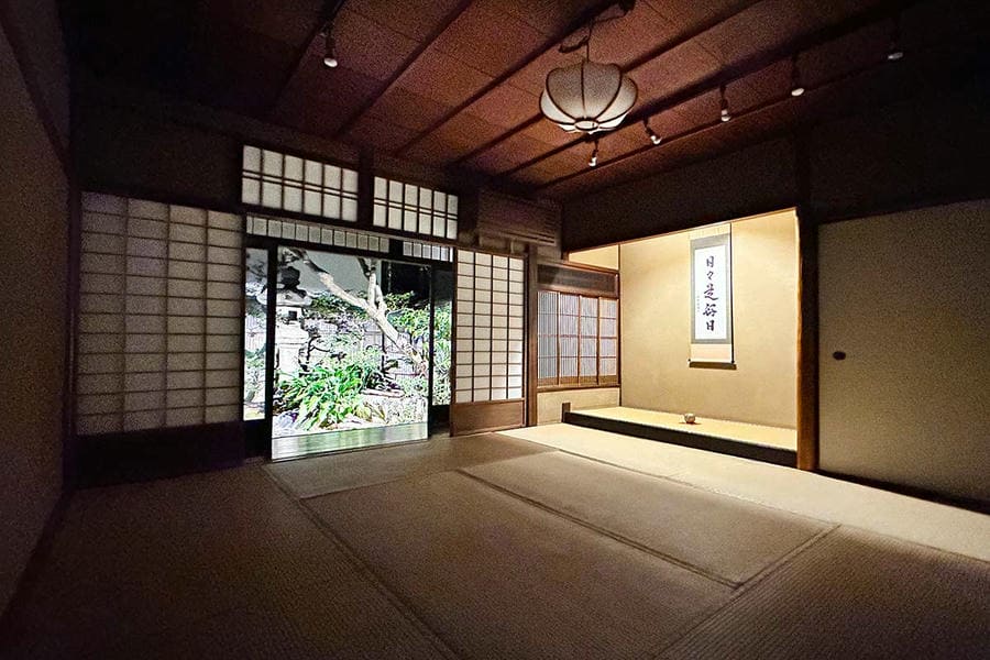 Traditional tea room prepared for an evening Kyoto tea ceremony experience